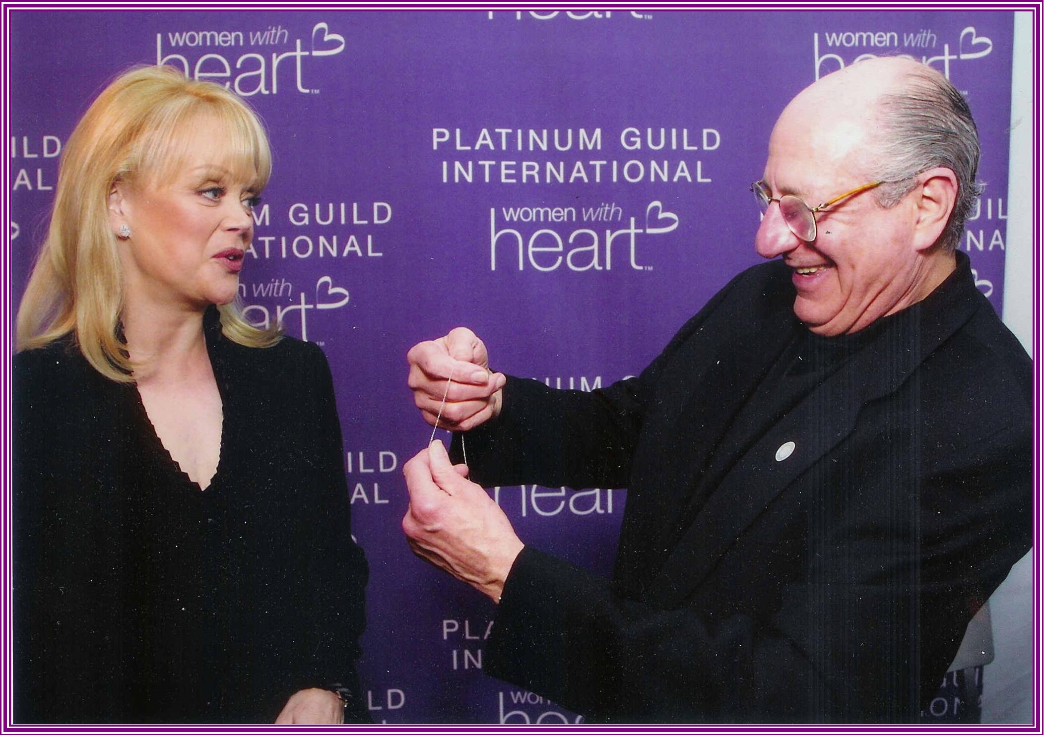 Jose Hess and Candy Spelling Platinum Diamond Heart 